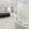 a bathroom with a tub and sink