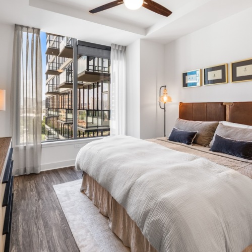 Bedroom with natural lighting and high ceilings