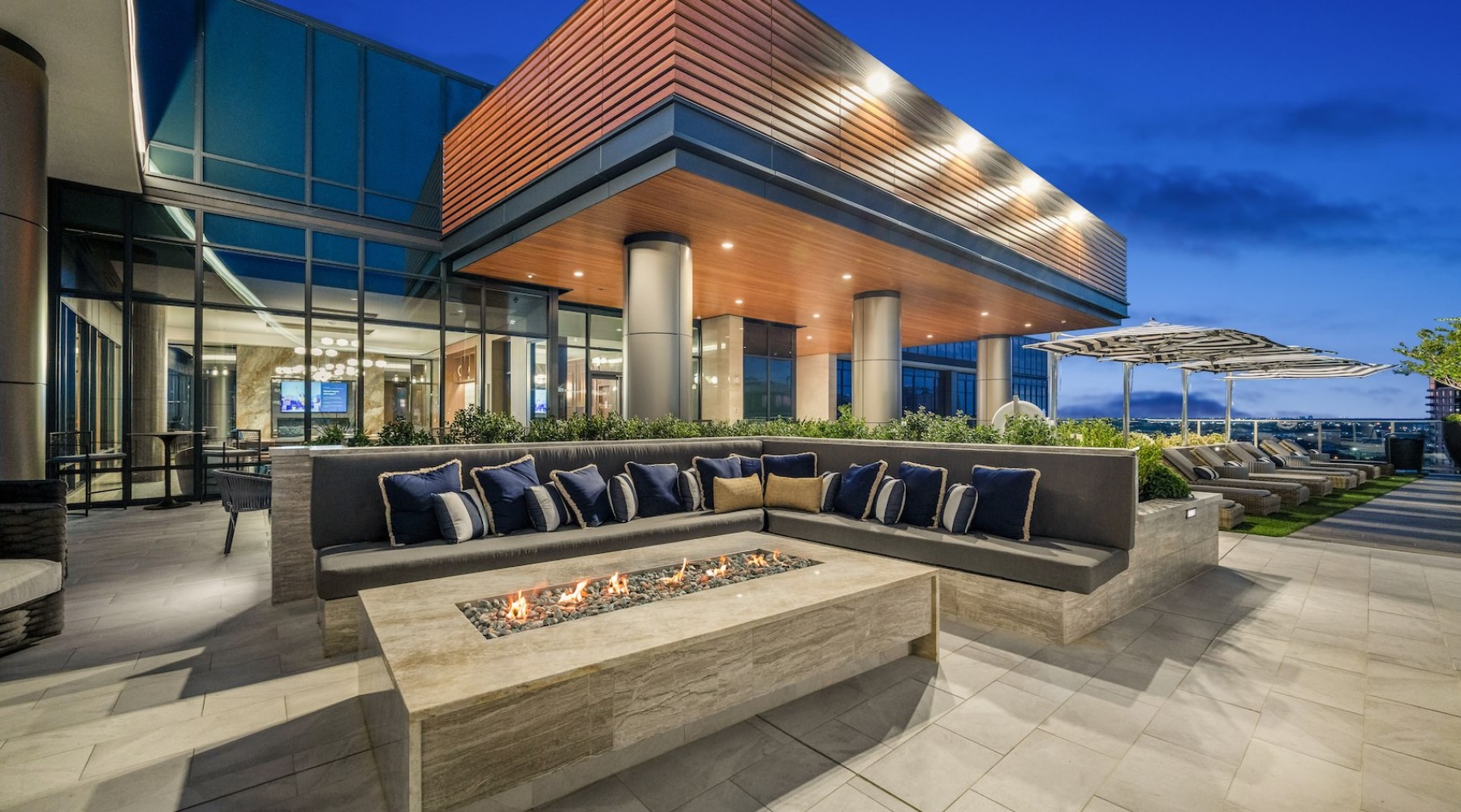 a seating area with a fire pit