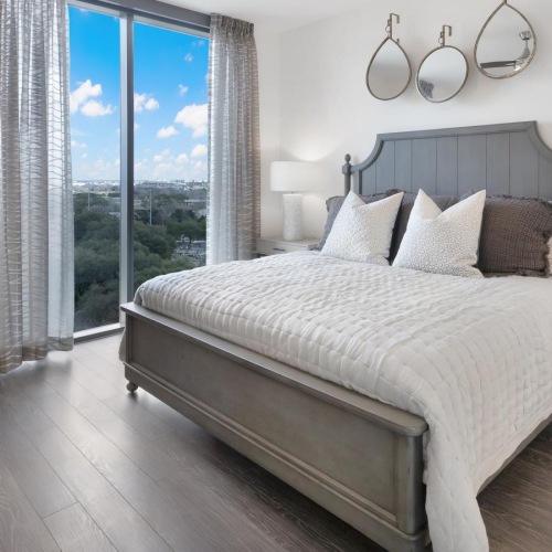 a bedroom with a large window