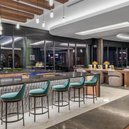 Beautiful clubroom with lounge seating and a kitchen